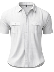 White short sleeve button-down shirt with two chest pockets and a subtle textured pattern.