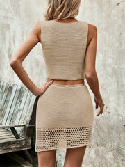 Tan crochet vest and mini skirt set with open knit detail on skirt hem.