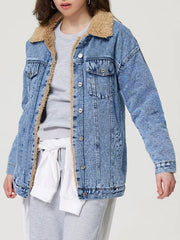 Light wash acid wash denim trucker jacket with sherpa collar and lining.