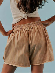 Tan pinstripe boxer shorts with elastic waistband