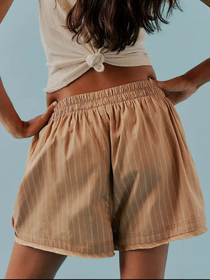 Tan pinstripe boxer shorts with elastic waistband