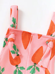Pink ribbed overalls with carrot print and knot shoulder straps.