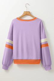 Lavender sweatshirt with orange neckline and cuffs, featuring contrast stripes on sleeves.
