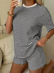 Black and white striped two-piece set with drawstring shorts and crew neck tee.