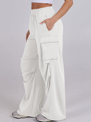 White drape wide leg sweatpants with cargo pockets and elastic waistband.