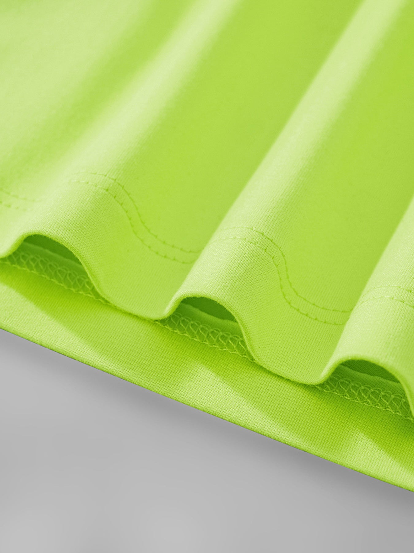 Crocodile graphic toddler t-shirt in neon green with crew neck and short sleeves.