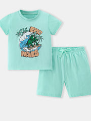 Toddler mint green cotton two-piece set with surfing triceratops graphic tee and drawstring shorts