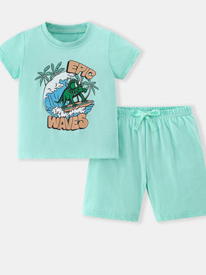 Toddler mint green cotton two-piece set with surfing triceratops graphic tee and drawstring shorts