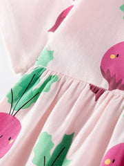 Pink cotton toddler dress with playful radish print and gathered waist detail.