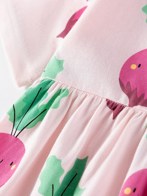 Pink cotton toddler dress with playful radish print and gathered waist detail.