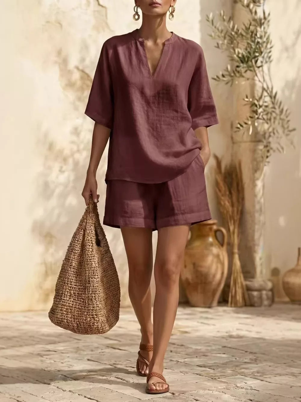Notched V-neck half sleeve lounge top in dusty rose, paired with matching shorts.