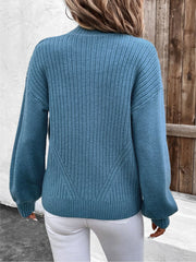 French Blue ribbed acrylic sweater with angled back detail and balloon sleeves.