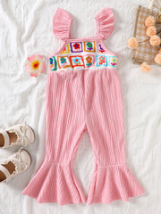 Pink crochet ruffle trim baby jumpsuit with bell bottoms and floral squares.