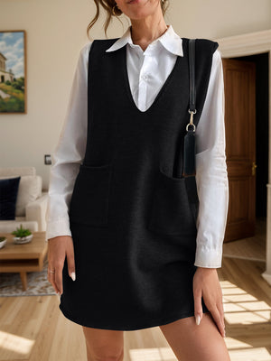 Black knit sleeveless mini dress with V-neck and patch pockets.