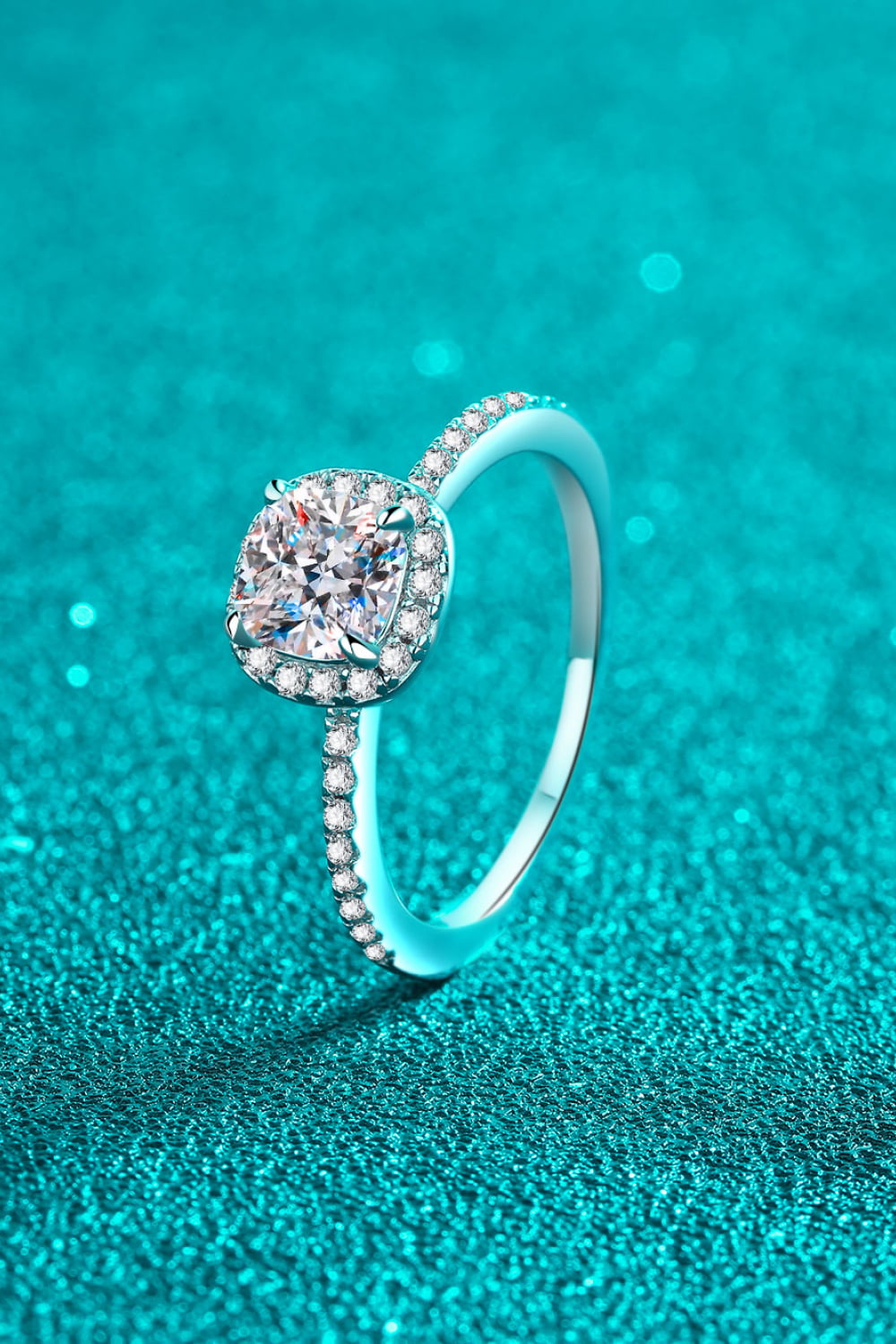 Silver cushion cut moissanite ring with pavé band