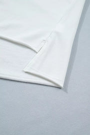 White cotton maternity tee with side slits and subtle star embellishments.