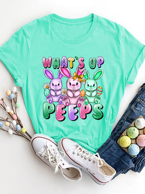 Aqua graphic tee with three bunnies and "What's Up Peeps" text, Easter theme.