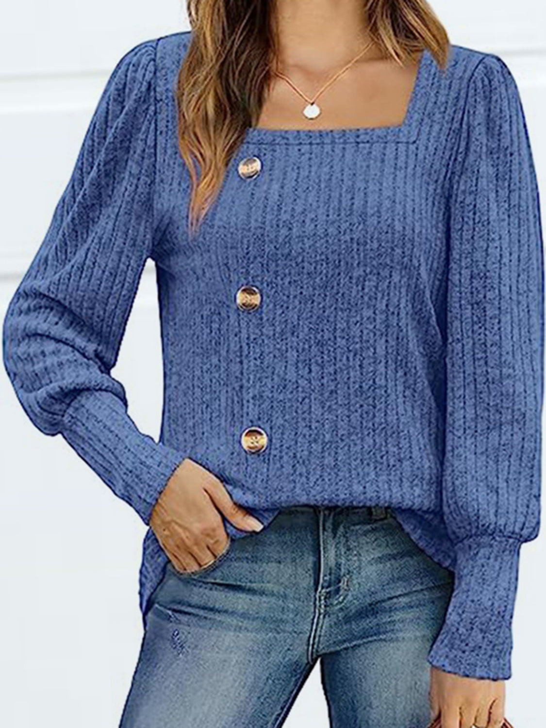 Dusty Blue ribbed knit blouse with puff sleeves, square neckline, and gold buttons.