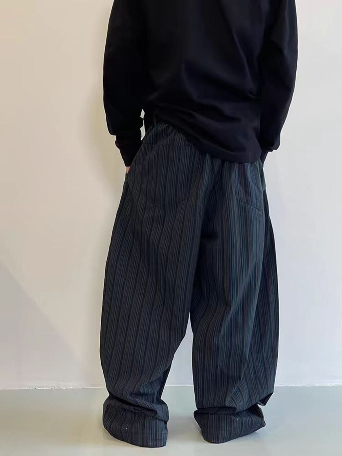 Men's dark pinstripe wide leg sweatpants with pockets