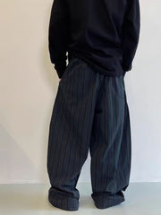 Men's dark pinstripe wide leg sweatpants with pockets