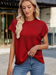 Scarlet knit cap sleeve top with vertical seam detail and crew neckline.