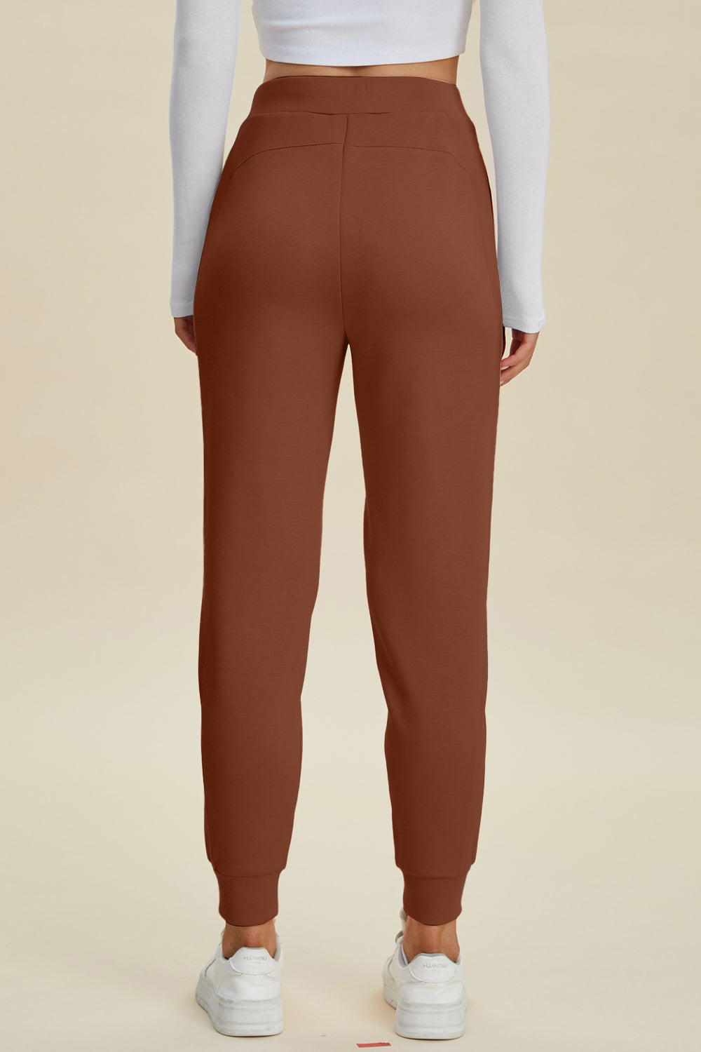 Caramel joggers with elastic cuffs and a comfortable fit.
