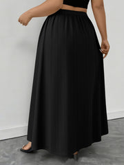 Black ribbed maxi skirt with a-line cut and pockets, shown on a model.