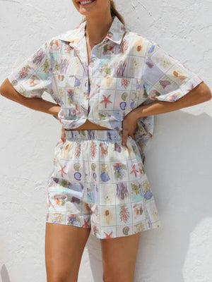 Citrus Checkered Resort Set with seashell print, button-up shirt and elastic waist shorts.