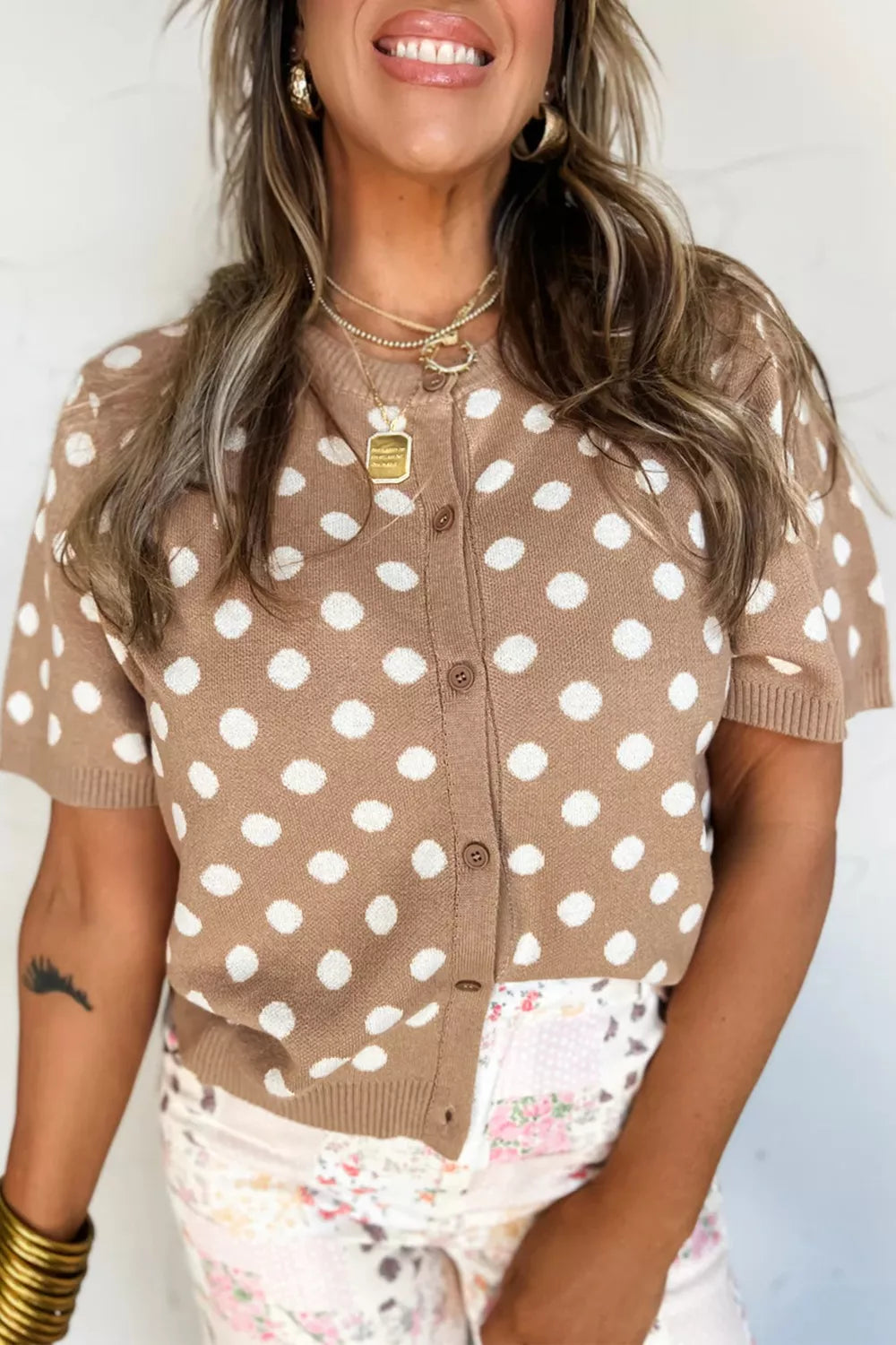 Camel polka dot short sleeve button-down cardigan with a crew neckline.