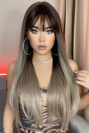 Ombre fringe synthetic hair extension in black to gray with straight cut and blunt bangs.