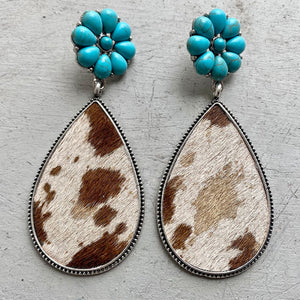 Turquoise petal & hide teardrop earrings with silver trim.
