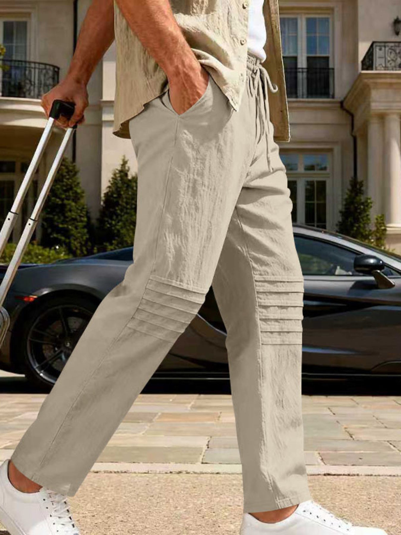 Men's Khaki linen-blend drawstring sweatpants with pleated knee detail.