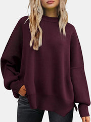 Wine ribbed knit sweater with slouchy sleeves and mock neck.