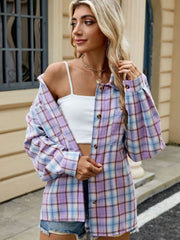 Checkered long sleeve collared top in purple and blue plaid with button front and chest pocket.