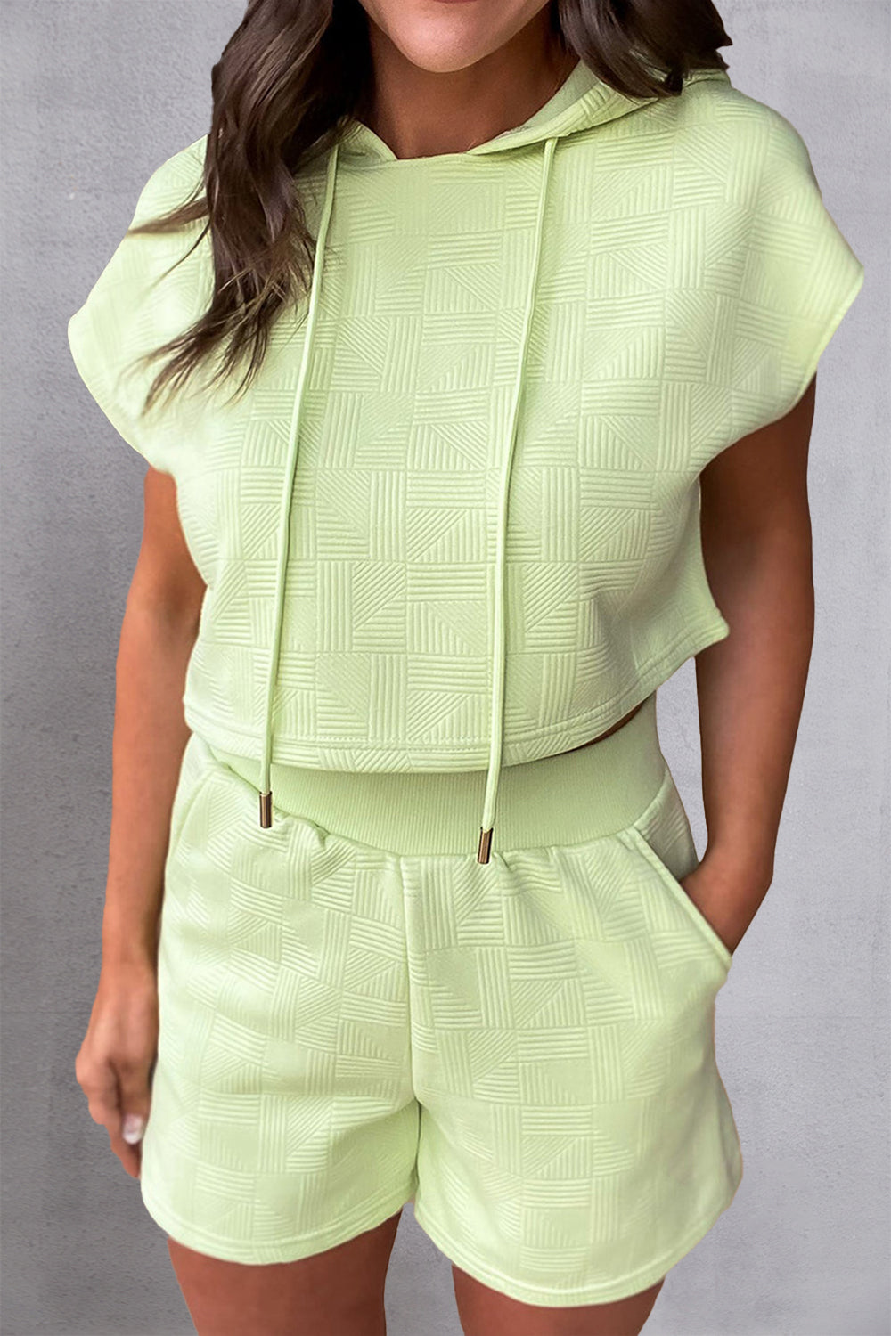 Textured light green crop hoodie and shorts set with geometric pattern