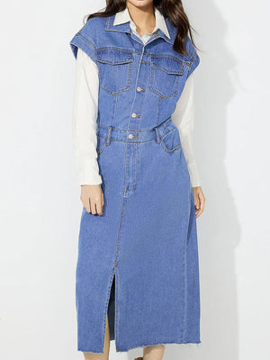 Sleeveless medium wash denim midi dress with button front, collar, and front slit.