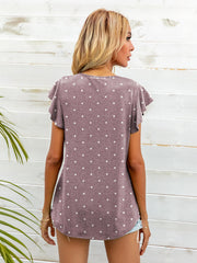 Ruffled sleeve tee in Light Mauve with white polka dots.