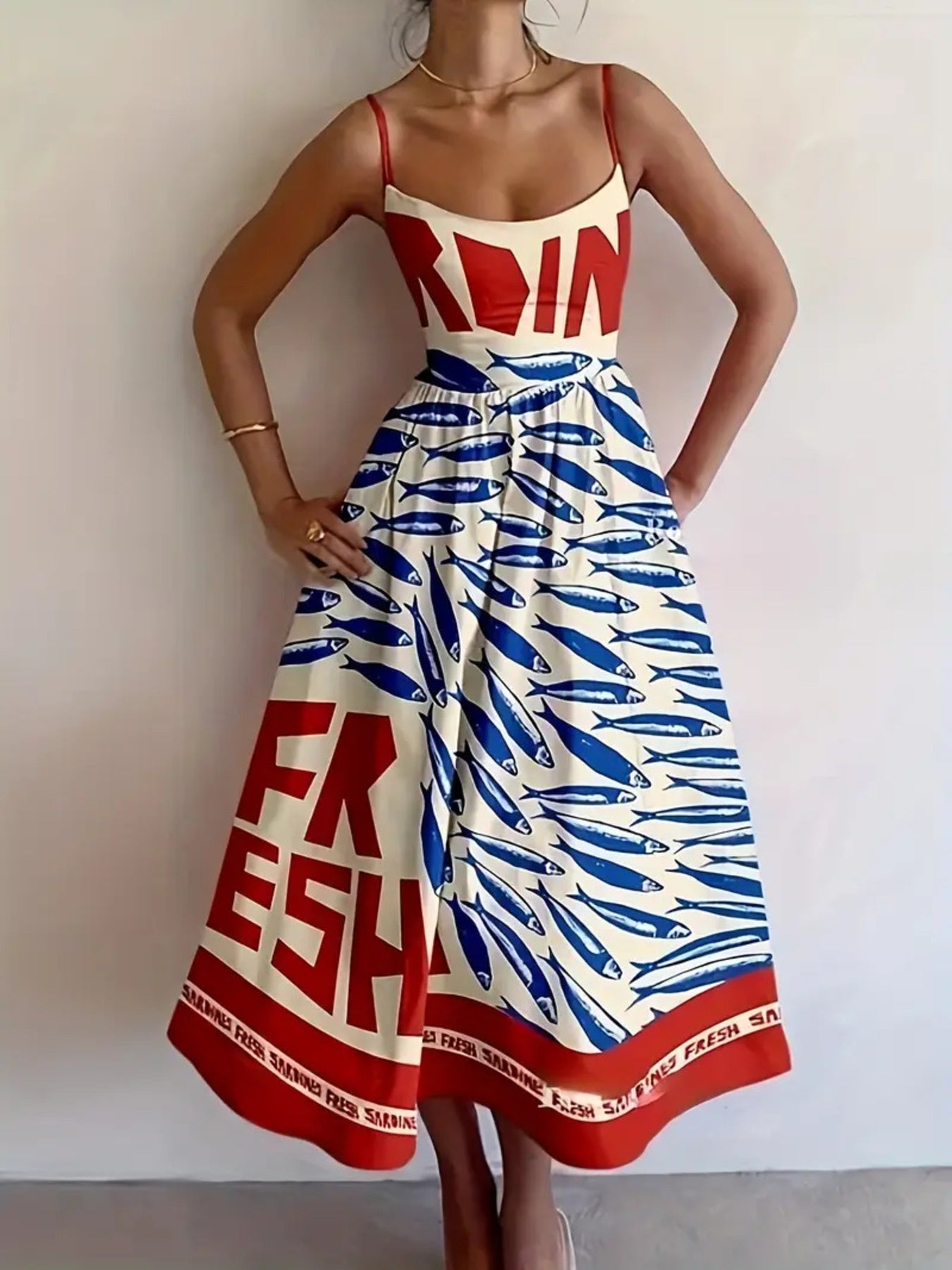 Spaghetti strap midi dress with bold sardine graphic print and "FRESH" text.