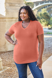 V-neck pocket tee in watermelon pink with short sleeves and a relaxed fit.