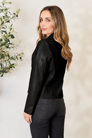Black faux leather biker jacket with a stand-up collar and a sleek, fitted silhouette.