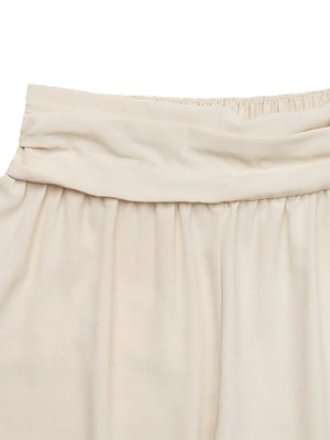 Cream ruched waistline balloon trousers with a gathered elastic waistband.