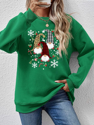 Green raglan sweatshirt with festive gnome graphic, snowflakes, and candy canes.
