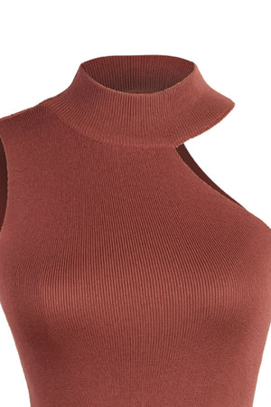 Brick red ribbed knit tank top with asymmetric cut-out detail and mock neck.