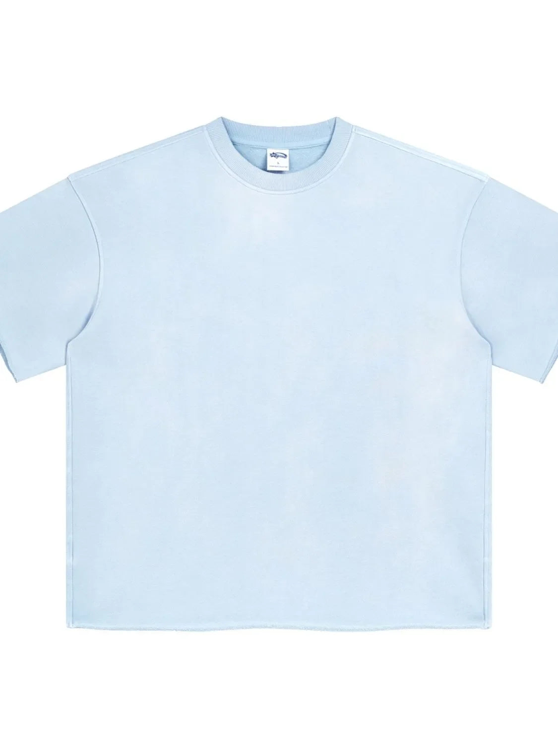 Light blue boxy t-shirt with raw edge hem and crew neck.