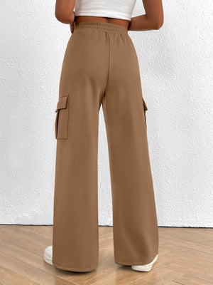 High waist cargo sweatpants in apricot with drawstring and side pockets.