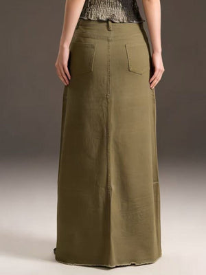 Army green cotton maxi denim skirt with raw hem and back pockets.