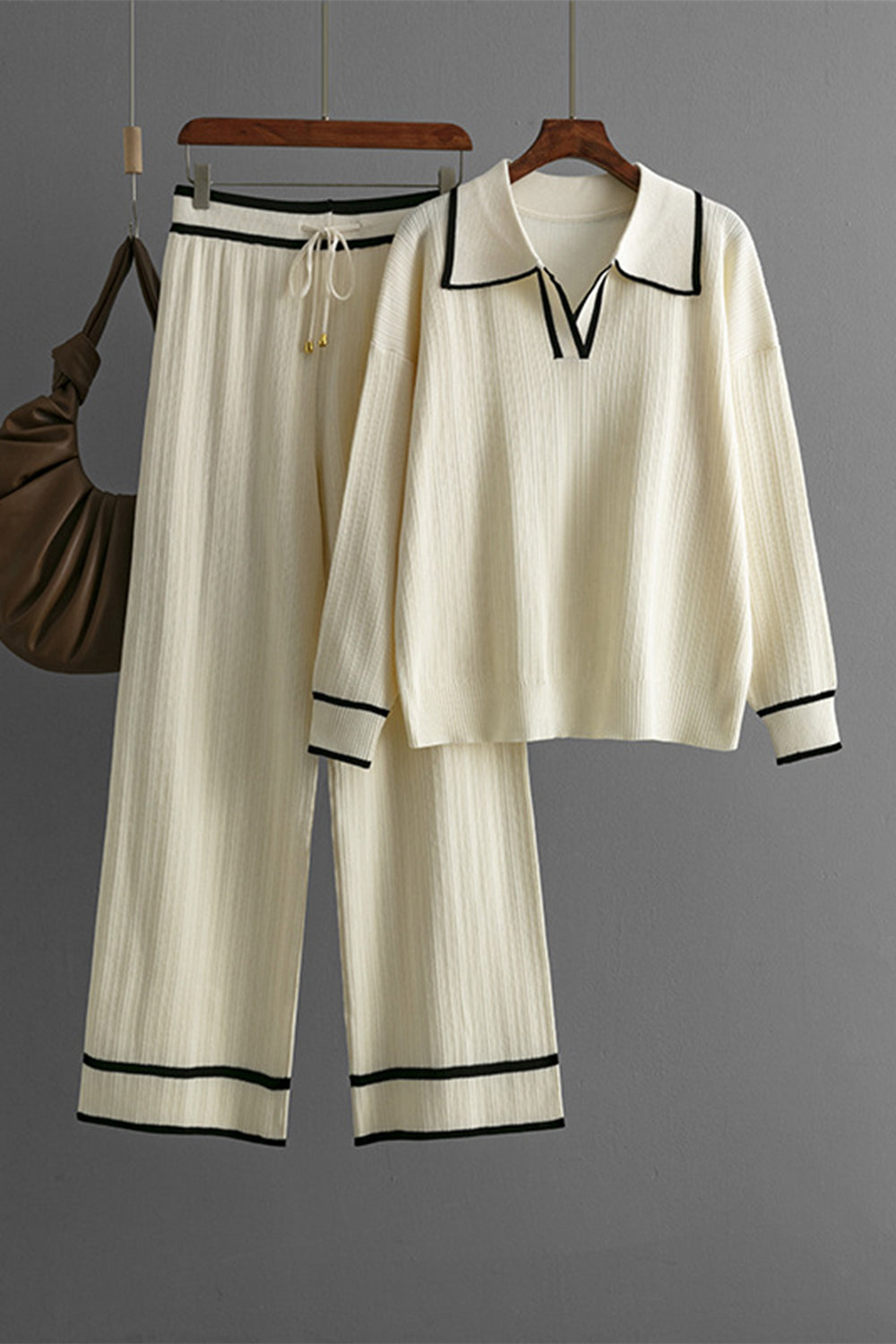 Cream ribbed knit loungewear set with contrast trim, collared top and wide leg pants