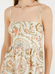 Vintage floral midi dress with spaghetti straps and a charming print of birds and flowers.