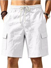 White cargo shorts with drawstring waist and crinkled texture