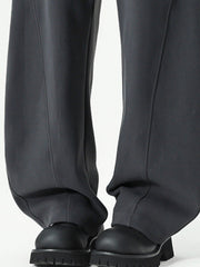 Men's gray relaxed fit sweatpants with diagonal seam detail